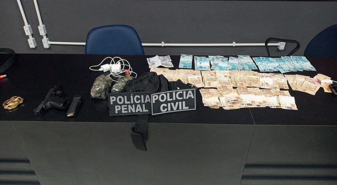 Policial penal é preso tentando entrar em presídio com R$ 5 mil, aparelho celular e cocaína